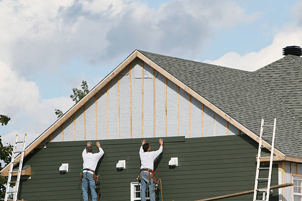 Professional Siding Installation technician working in Lexington, TN